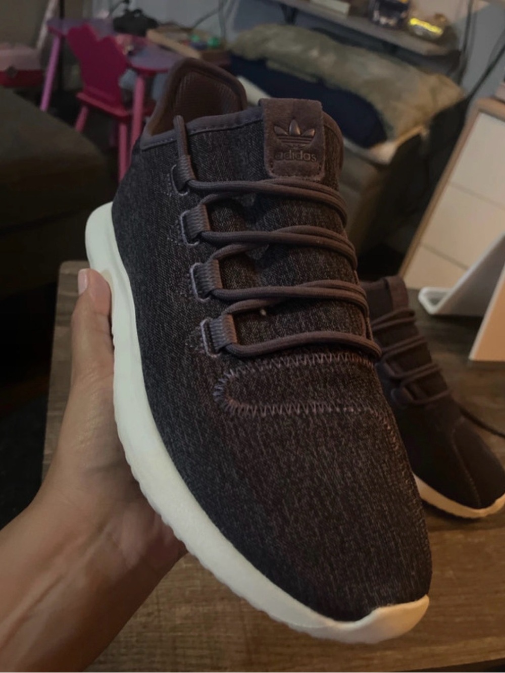 Purple woman’s Adidas Tubular Sneakers